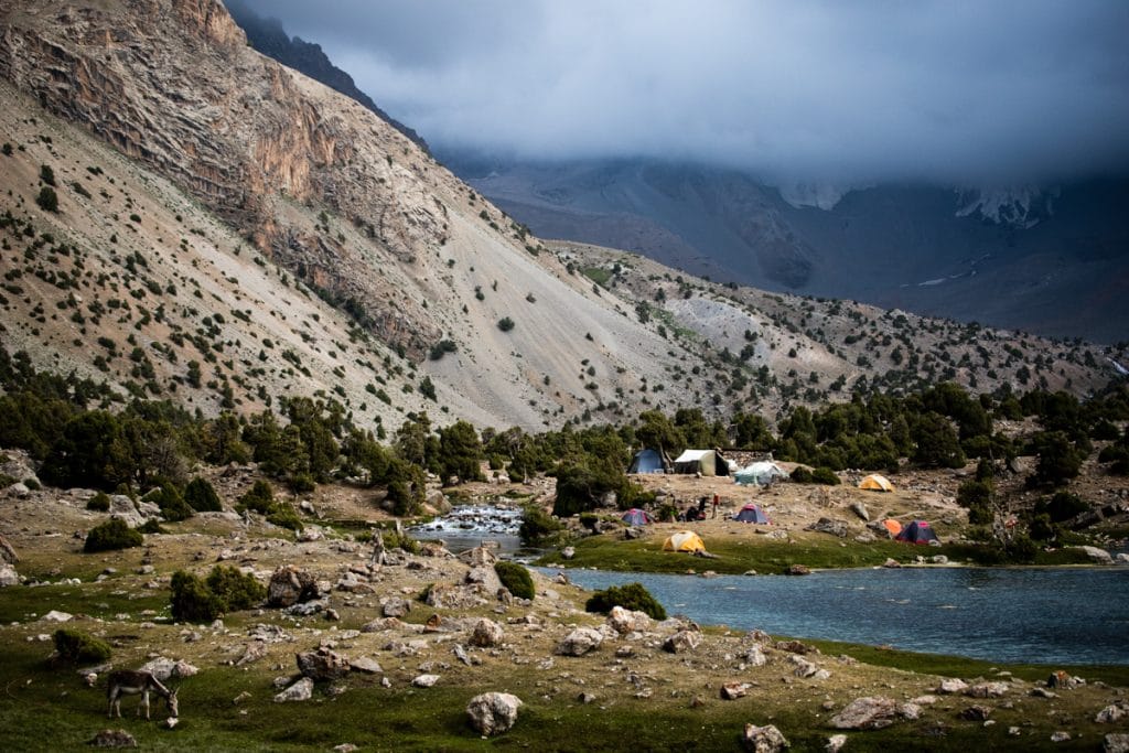 Kulikalon camping tents pitched in an open mountain valley